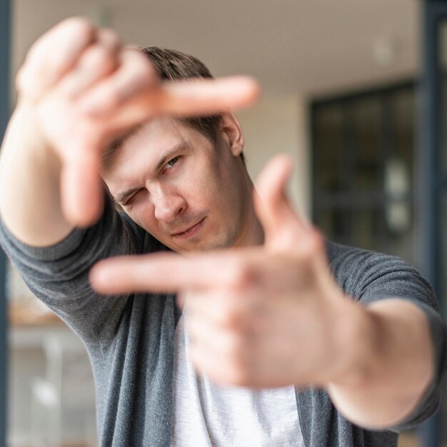 Front view of man using sign language