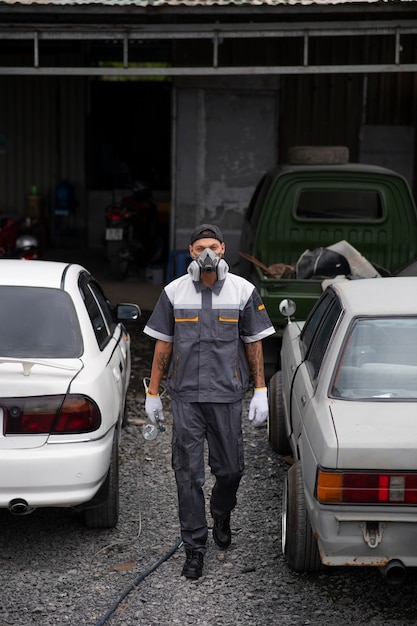 Front view man wearing protective equipment