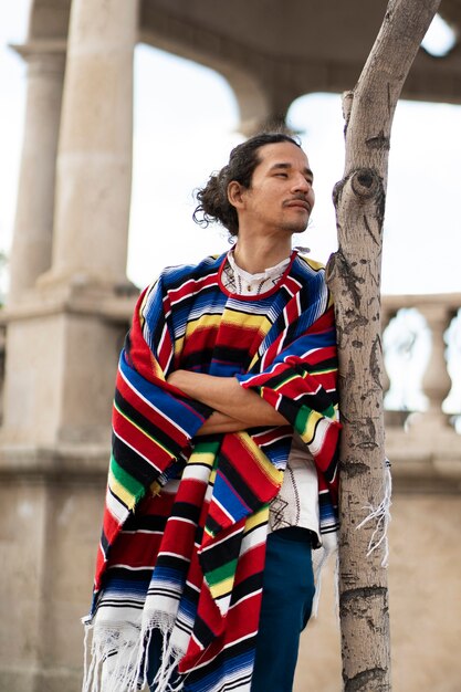 Front view man wearing traditional clothes