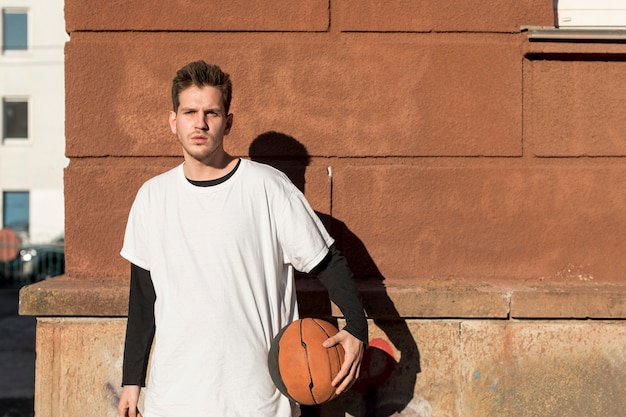 Front view man with a basketball