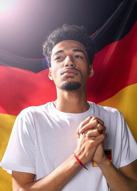 Front view of man with german flag