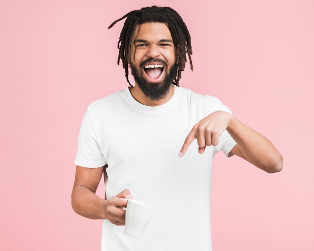 Front view man with a mug