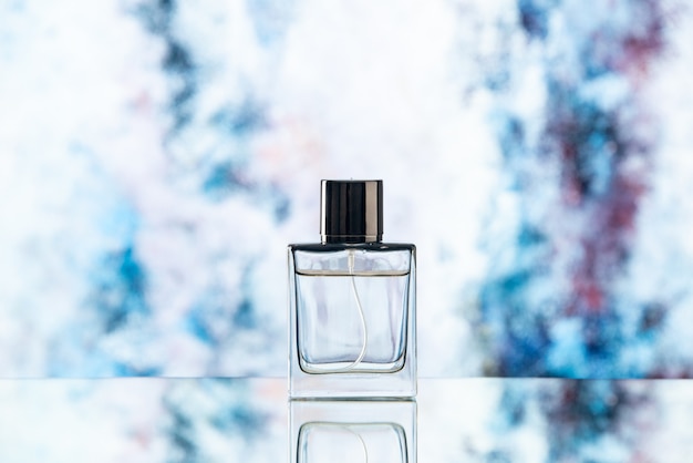 Front view men cologne on light blue blurred background