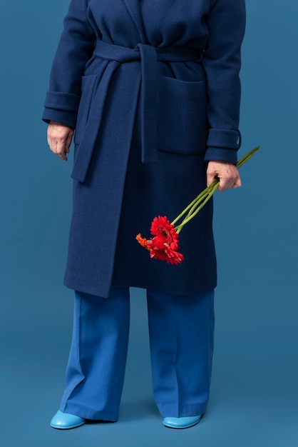 Front view model holding flowers