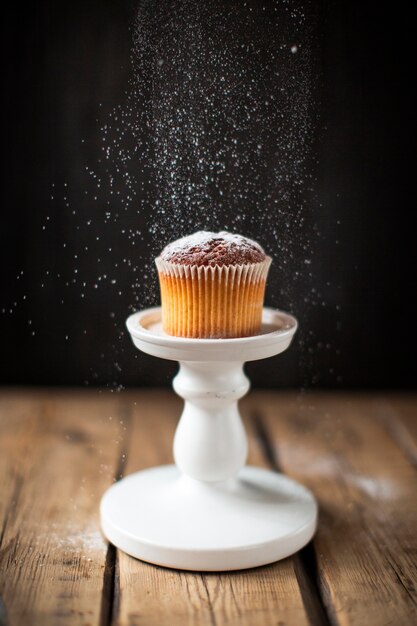 Front view muffin with powdered sugar