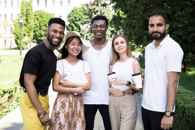 Front view of a multiracial group of friends