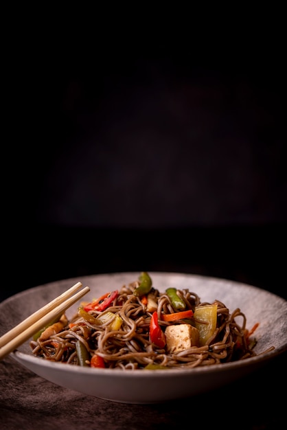 Free Photo front view of noodles in bowl with vegetables