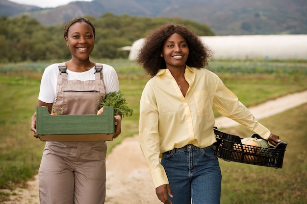 Front view peasant women with harvest