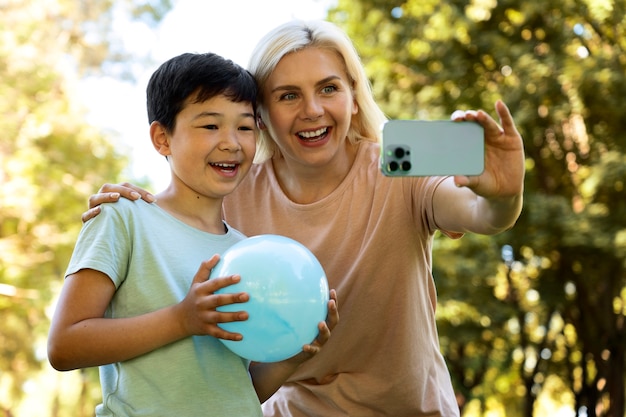 Front view people holding ball