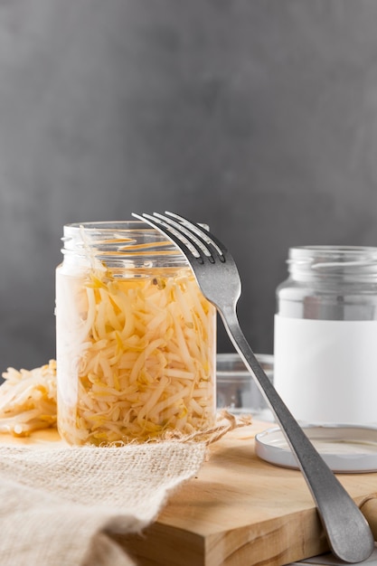 Front view of pickled vegetables in glass jar