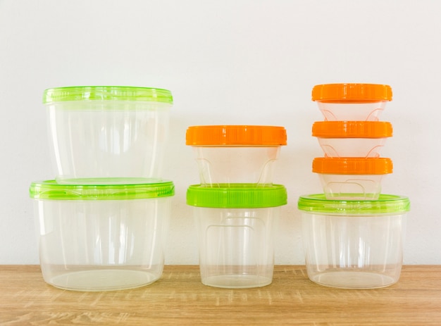 Free photo front view of plastic casseroles