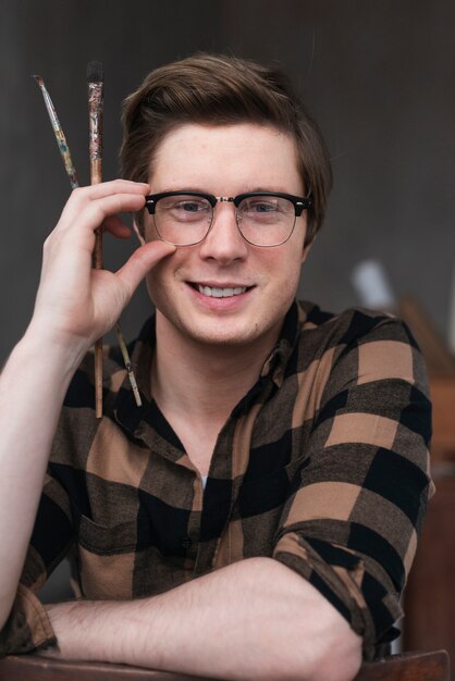 Front view portrait of artist man posing