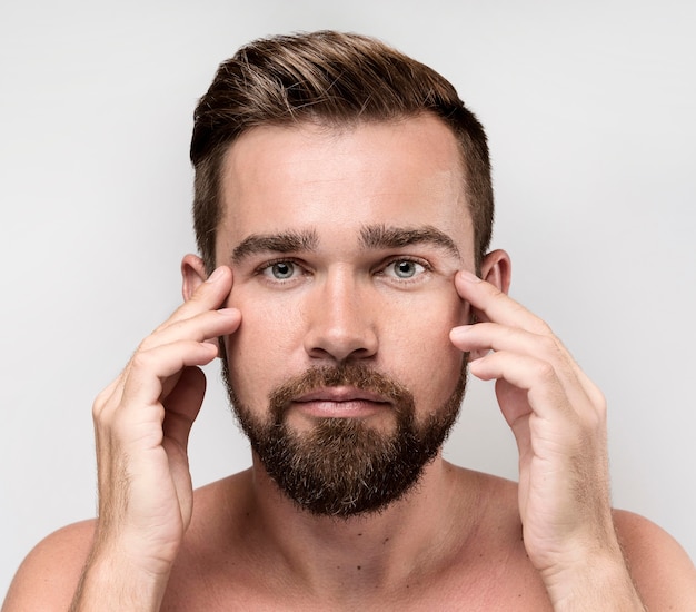 Front view portrait of serious handsome man