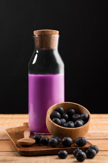 Front view purple smoothie with blueberries