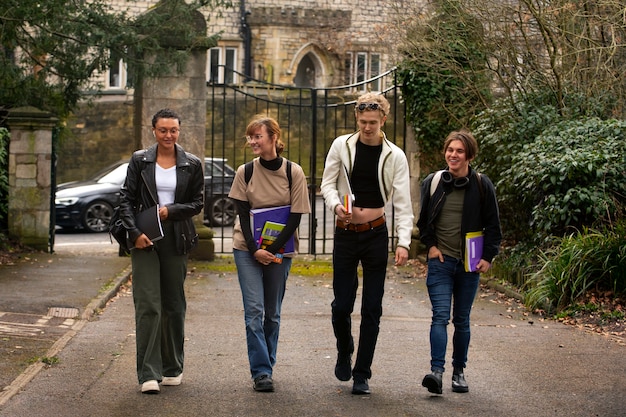 Free Photo front view queer students outdoors