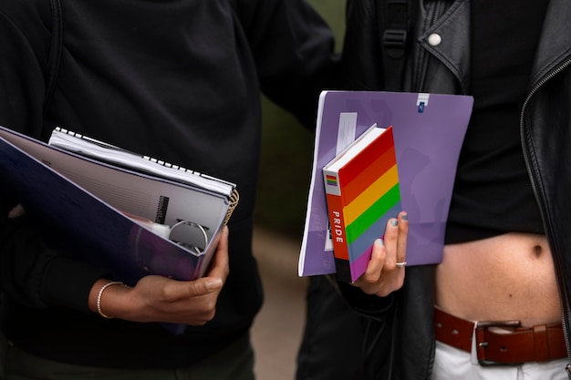 Free photo front view queer students outdoors