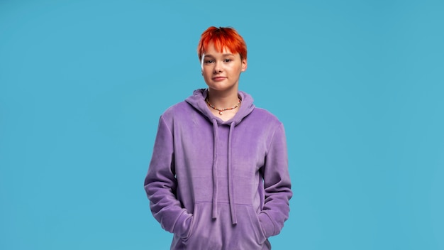 Front view queer woman posing in studio