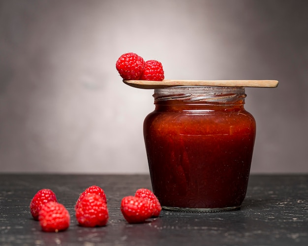 Front view of raspberry jam in jar