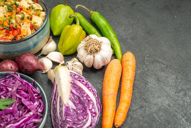 Front view red cabbage with fresh vegetables on dark grey table diet health ripe salad