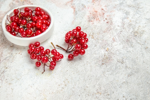 Front view red cranberries on a white table fresh berry red fruit