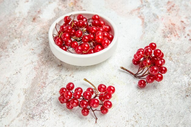 Front view red cranberries on white table fresh berry red fruit