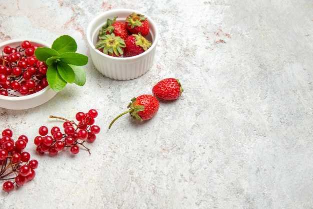 Front view red fruits with berries on white table red fresh berry fruit