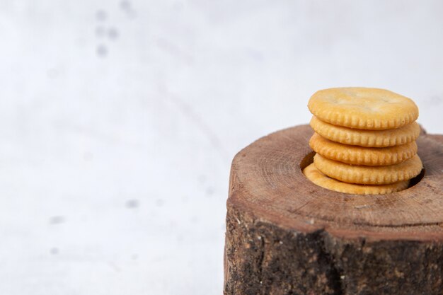 Front view round cookies on wooden desk