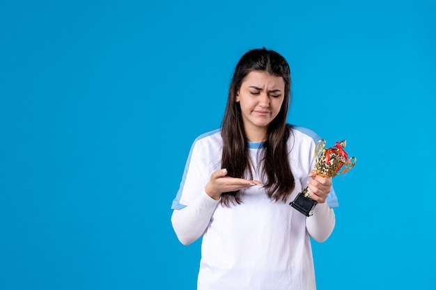 Front view sad female player with cup