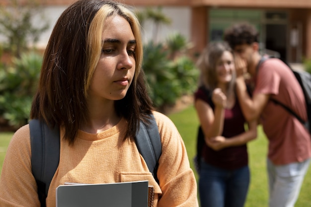 Front view sad girl being bullied