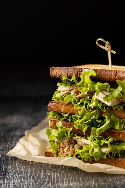 Free photo front view of salad sandwich with copy space