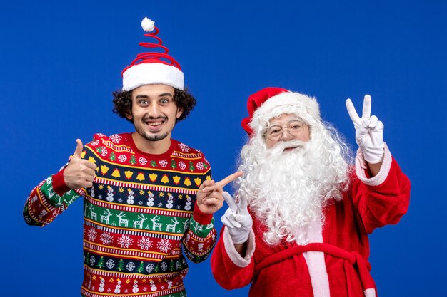 Front view santa claus with young male