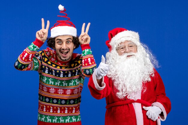 Front view santa claus with young male