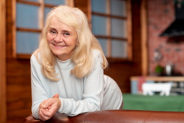 Front view senior woman at home