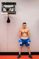 Free photo front view of shirtless male boxer