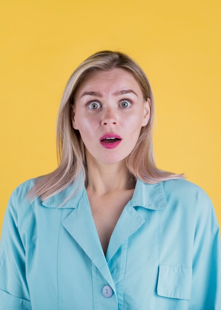 Free Photo front view of shocked blonde woman