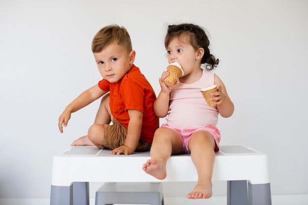 Front view siblings with ice cream