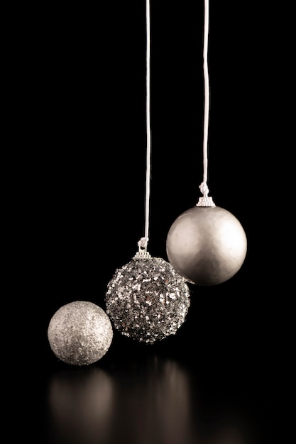 Front view of silver hanging christmas globes