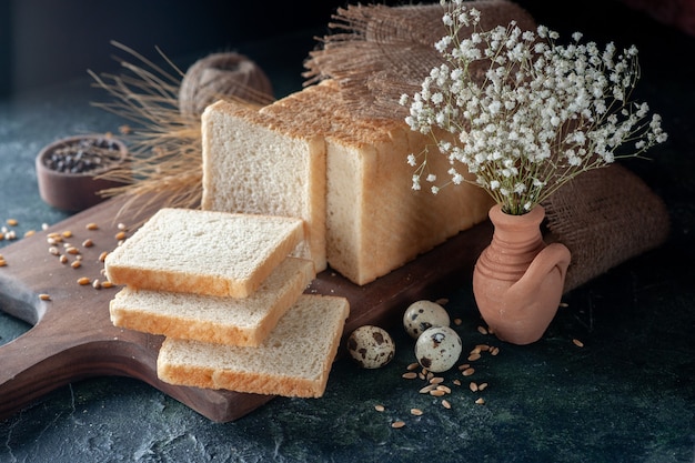 Front view sliced bread on dark blue background bun dough bakery tea morning loaf food breakfast