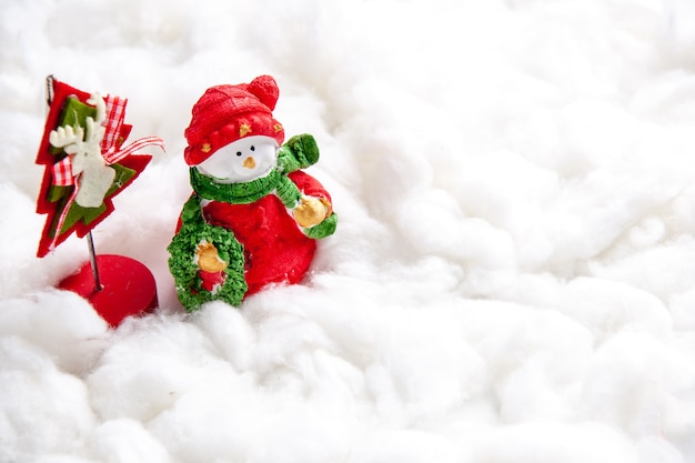 Front view small xmas toys on white background