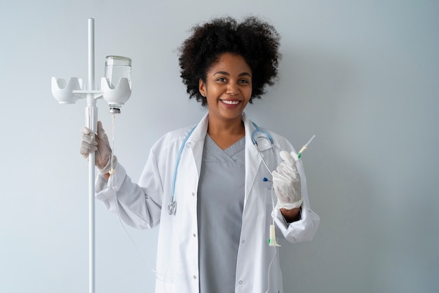 Front view smiley black female doctor