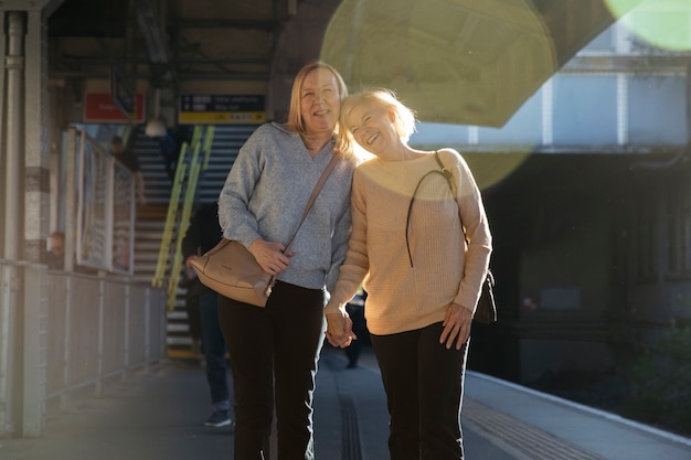 Free Photo front view smiley couple holding hands