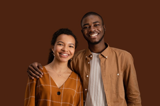 Front view of smiley couple posing together