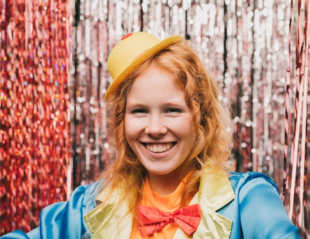 Free Photo front view smiley female at carnival party