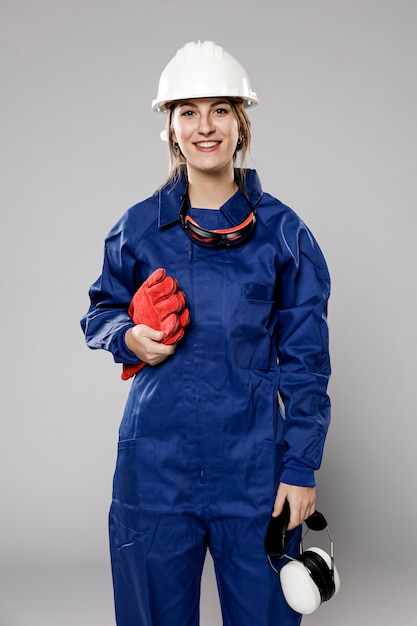 Free Photo front view of smiley female construction worker