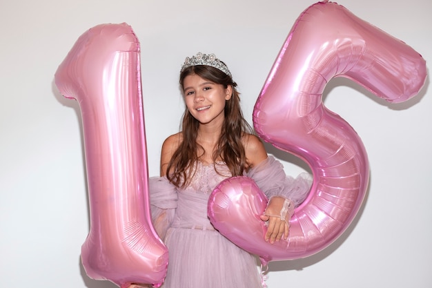 Front view smiley girl with balloons