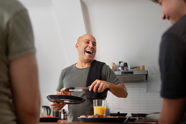 Front view smiley man cooking