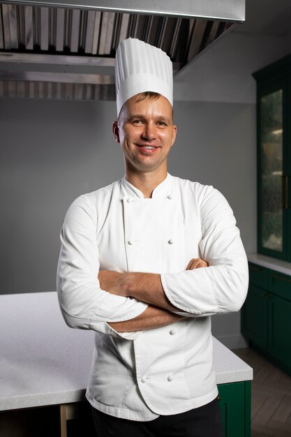 Front view smiley man in kitchen