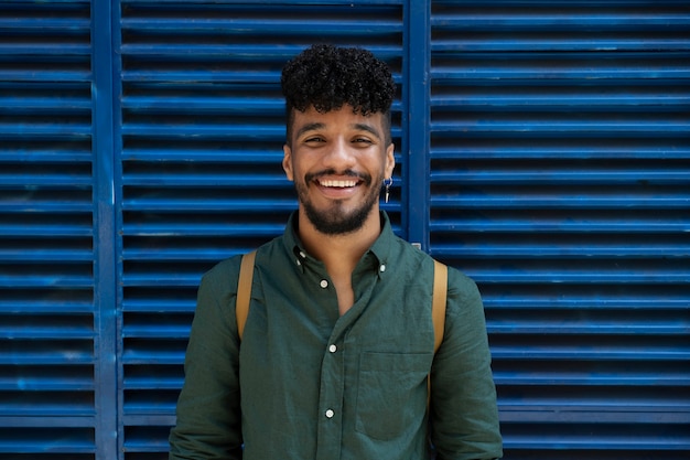 Free photo front view smiley man posing