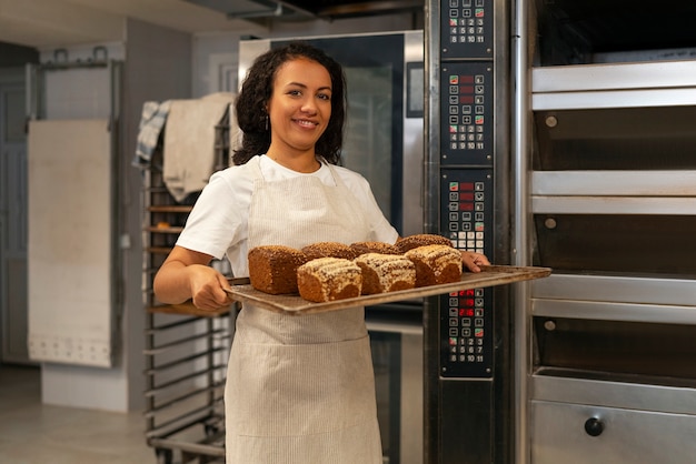 Front view smiley woman baking