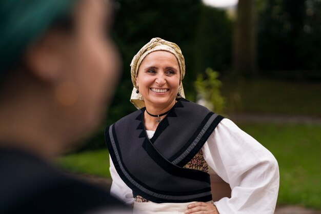 Front view smiley woman outdoors